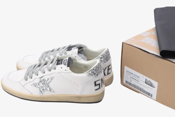 Golden Goose Ball Star white leather sneakers with silver glitter star and heel, side view with original box. - SKU GWF00117.F002564.10273