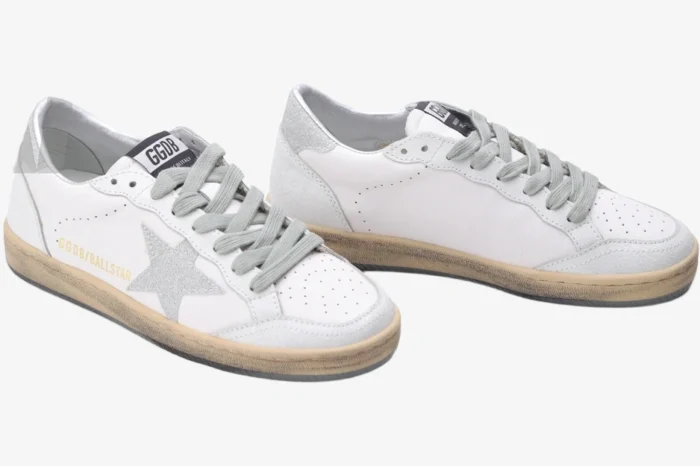 Golden Goose Ball Star sneakers in white leather with silver glitter star and heel, three-quarter view. - SKU GWF00117.F002573.10915