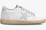 Side view of Golden Goose Ball Star sneakers in white leather with a silver glitter star and heel tab. - SKU GWF00117.F002573.10915