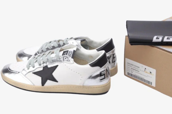 Golden Goose Ball Star white and silver distressed sneakers with black star, side view with box. - SKU GWF00117.F002517.10272