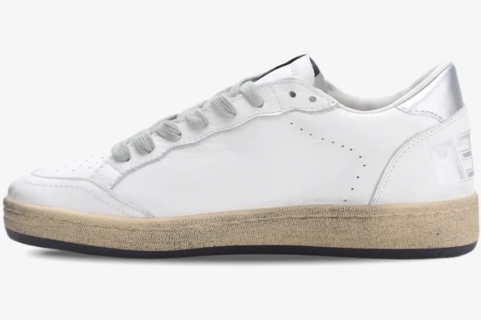 Side profile of Golden Goose Ball Star white and silver distressed leather sneakers. - SKU GWF00117.F002570.10925