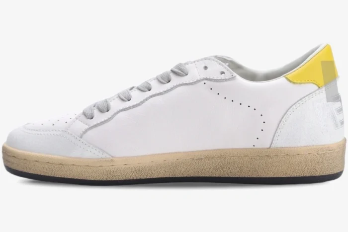 Golden Goose Ball Star sneaker in white leather with yellow heel tab, side profile view. - SKU GMF00117.F002558.10915
