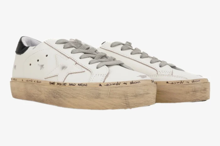 White and black Golden Goose Hi Star platform sneakers with distressed soles, side view. - SKU GWF00118.F000329.10271
