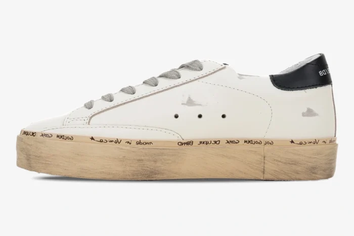 Golden Goose white and black Hi Star platform sneakers, side profile view with distressed sole. - SKU GWF00118.F000329.10271
