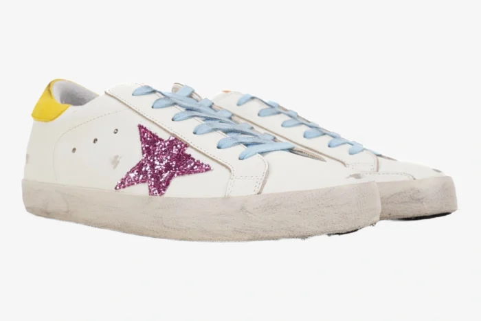 Golden Goose Super-star white leather sneakers with pink glitter star and light blue laces, side view. - SKU GWF00101.F002559.10928