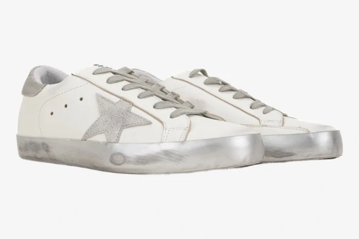 Golden Goose white and silver Super-Star sneakers with glitter star and distressed sole, side view. - SKU GMF00101.F000312.10273