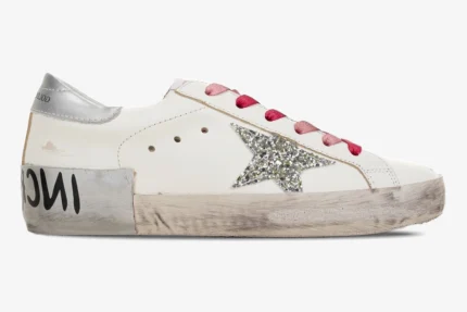 White Golden Goose Superstar Incredible Woman sneaker with silver glitter star and pink laces, side view. - SKU GWF00101.F001241.80185
