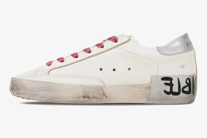 Golden Goose Superstar Incredible Woman sneaker in white with pink laces, side profile view. - SKU GWF00101.F001241.80185