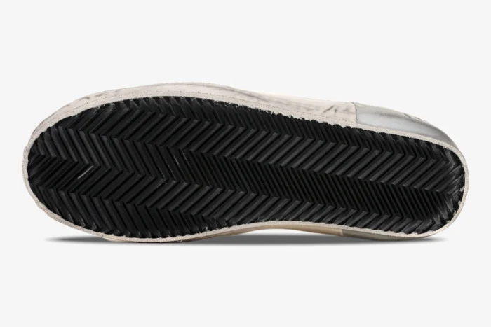 Bottom view of Golden Goose Superstar Incredible Woman sneaker showing black herringbone rubber outsole. - SKU GWF00101.F001241.80185