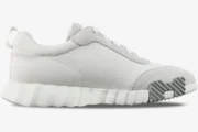 Hermes Bouncing Sneakers in white and grey mesh, shown from a side profile view with a chunky sole. - SKU H202934ZH02
