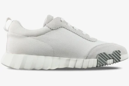 Hermes Bouncing Sneakers in white and grey mesh, shown from a side profile view with a chunky sole. - SKU H202934ZH02