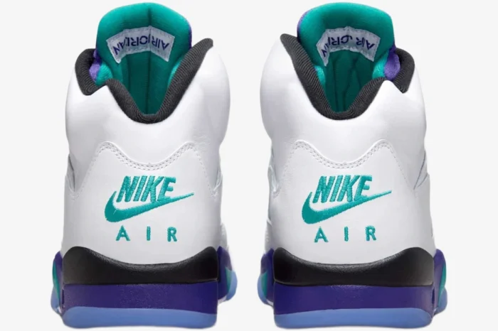Rear view of Jordan Air Jordan 5 Retro OG Grape sneakers in white with teal and purple accents. - SKU HQ7978-100