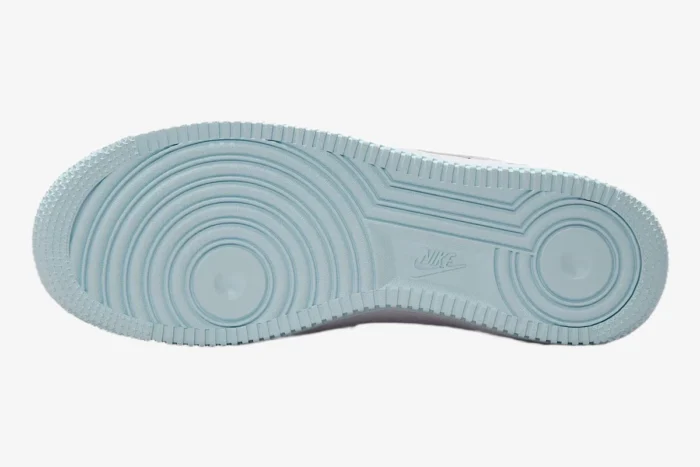 Bottom view of Nike Air Force 1 '07 Cotton Candy showing the light blue rubber outsole with pivot point tread. - SKU DD8959-100