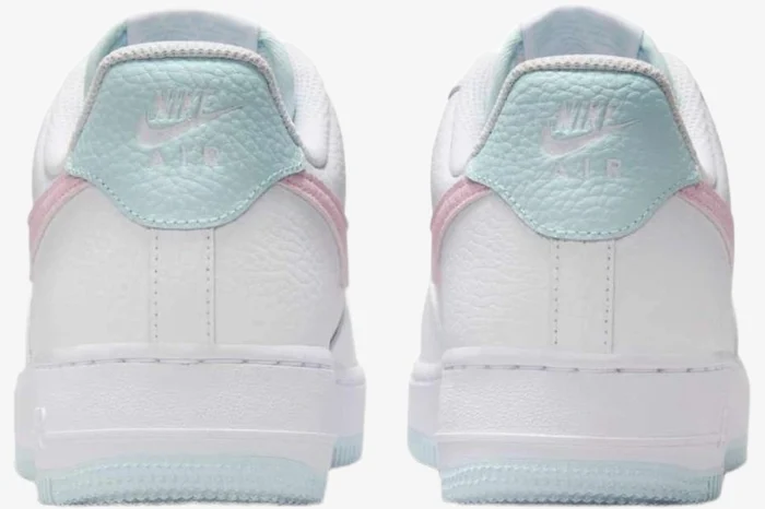 Rear view of Nike Air Force 1 '07 Cotton Candy sneakers in white with light blue and pink accents. - SKU DD8959-100
