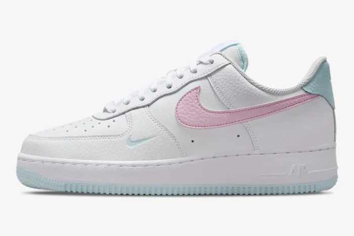 Side profile of Nike Air Force 1 '07 Cotton Candy sneaker in white with pink swoosh and light blue accents. - SKU DD8959-100
