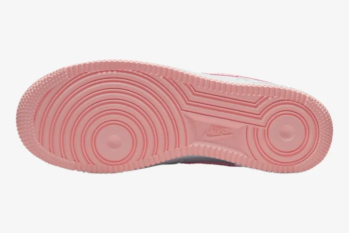 Bottom outsole view of pink Nike Air Force 1 '07 Valentine's Day sneakers showing traction pattern. - SKU DQ9320-100