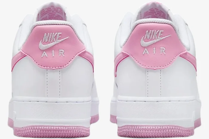 Rear view of Nike Air Force 1 Low Bubblegum sneakers featuring white leather and pink accents. - SKU FJ4146-101