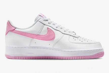 Side profile of Nike Air Force 1 Low Bubblegum sneakers in white with pink accents. - SKU FJ4146-101
