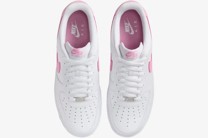 Top-down view of white Nike Air Force 1 Low Bubblegum sneakers with pink accents and white laces. - SKU FJ4146-101