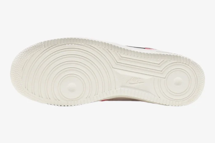 Outsole view of Nike Air Force 1 Low Neapolitan in sail white with pivot point tread. - SKU FQ6850-621