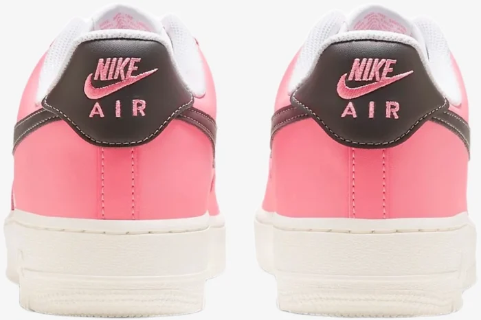 Rear view of Nike Air Force 1 Low Neapolitan sneakers featuring pink leather and brown heel tabs. - SKU FQ6850-621