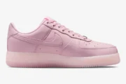 Side profile of a Nike Air Force 1 x NOCTA sneaker in Pink Foam with a translucent sole. - SKU CZ8065-600