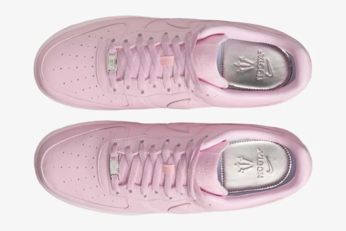 Top-down view of the Nike Air Force 1 x NOCTA Pink Foam sneakers featuring silver insoles. - SKU CZ8065-600