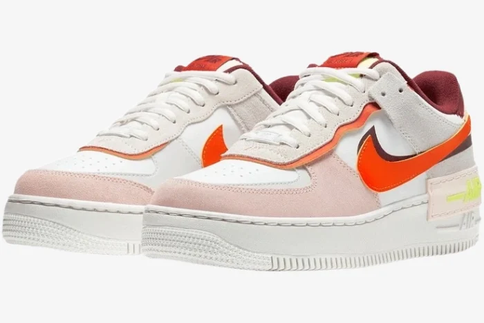 Nike Air Force 1 Low Shadow Orange Pearl sneakers in a three-quarter front view. - SKU CU8591-600