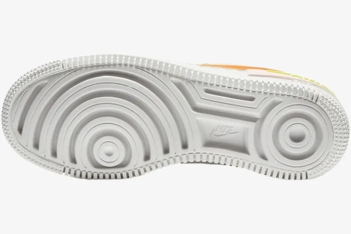 White outsole of Nike Air Force 1 Shadow Orange Pearl with concentric circle traction pattern. - SKU CU8591-600