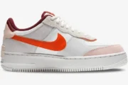Nike Air Force 1 Shadow in Orange Pearl, side profile view with white and pink accents. - SKU CU8591-600
