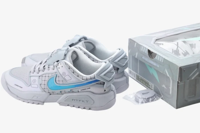 RTFKT x Nike Dunk Genesis 'OG' sneakers in grey and blue, rear three-quarter view with original box.