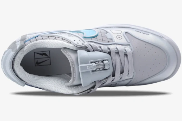 Top-down view of the RTFKT x Nike Dunk Genesis 'OG' sneaker in light grey with blue accents.